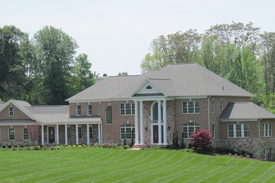 Photo of an expansive traditional home in DC Metro.