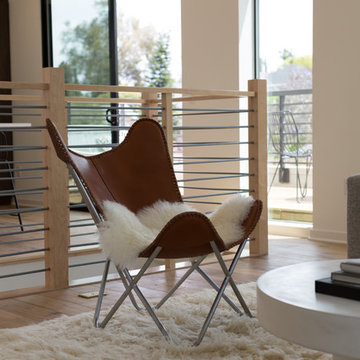 Brown Leather Butterfly Chair with Sheepskin Throw