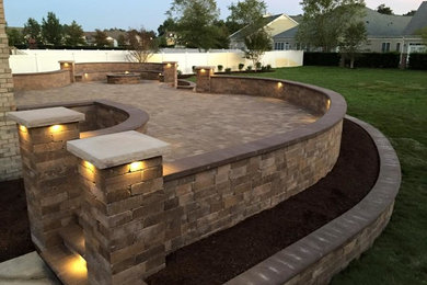 Design ideas for a traditional stone landscaping in Other.