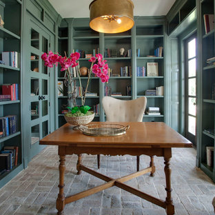 Inspiration for a mid-sized mediterranean study room in Dallas with green walls, brick floors and a freestanding desk.