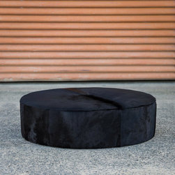Round Black Cowhide Ottomans - Footstools And Ottomans