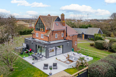 Inspiration for a rustic house exterior in Essex.