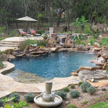 Pool Spa with Moss Rock lining the pool