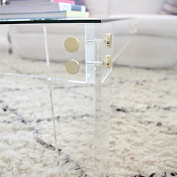 Brass accents are pictured but highlights also come in a Chrome finish.  Accents - Coffee Tables
