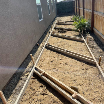 hybrid fence with concrete walkway