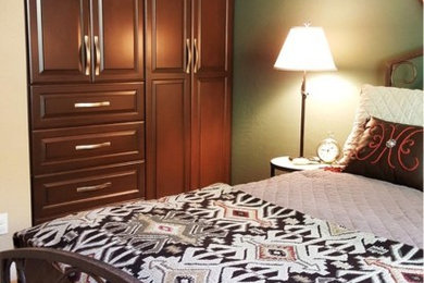 Bedroom - mid-sized traditional guest bedroom idea in New York with green walls