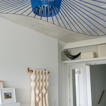 Scandi Home Office With Blue Sculptural Pendant and Wall Hanging