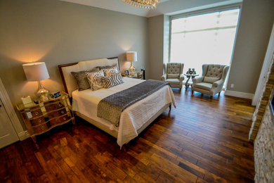 Example of a large transitional master dark wood floor bedroom design in Other with a standard fireplace and a stone fireplace