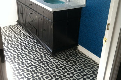 Inspiration for a mid-sized contemporary master multicolored tile and ceramic tile ceramic tile bathroom remodel in Los Angeles with an undermount sink, furniture-like cabinets, dark wood cabinets, marble countertops and blue walls