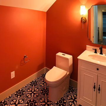 Statement Powder Room: Warm Orange Walls + Timeless Black and White Floral Motif