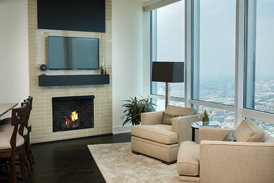 Inspiration for a mid-sized transitional formal open concept living room in Chicago with white walls, dark hardwood floors, a standard fireplace, a tile fireplace surround and a wall-mounted tv.