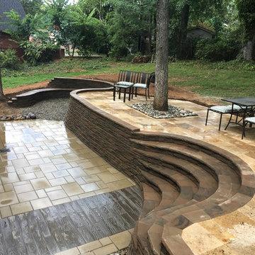 Multi-Level Paver Patio with Staircase and Seating