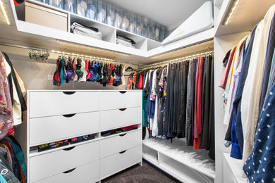 Design ideas for a women's storage and wardrobe in Brisbane.