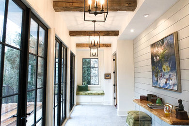 Hallway - large transitional ceramic tile and gray floor hallway idea in Other with white walls