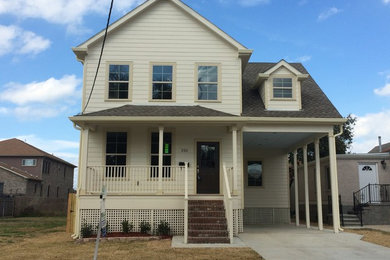 Inspiration for a timeless concrete fiberboard exterior home remodel in New Orleans
