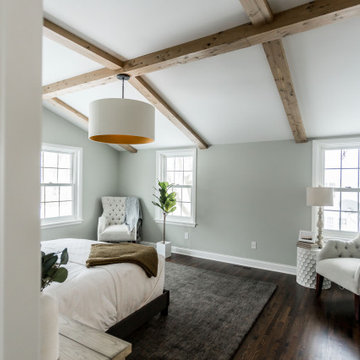 Antique White Oak Box Beams on Vaulted Ceiling in a Modern Master Bedroom