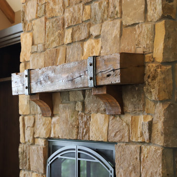 Reclaimed Mantel with Hand Forged Metal Strap and Square Pyramid Rivets