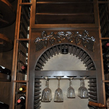 Grapevine Hand Carved Arch with Glass Wine Rack Texas Master Builders