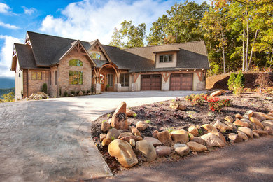 Inspiration for a large craftsman open concept game room remodel in Other with a stone fireplace and a media wall