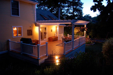 This is an example of a tropical porch design in Boston.