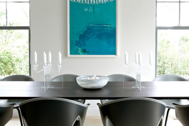 Example of a trendy dining room design in New York