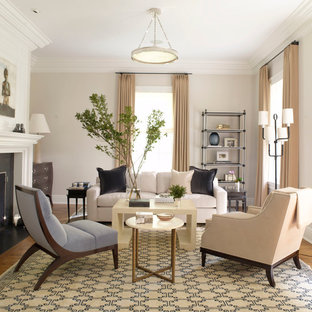 Living room - mid-sized transitional medium tone wood floor and brown floor living room idea in Dallas with gray walls, a standard fireplace and a wood fireplace surround