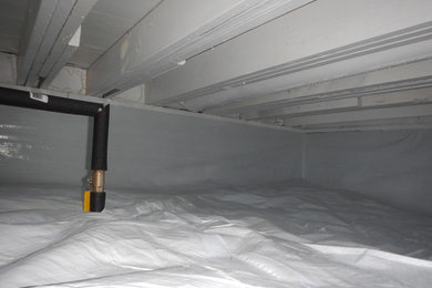 Imagen de sótano en el subsuelo contemporáneo grande con paredes blancas
