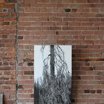 How to Hang Art on Stone or Brick Walls