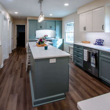 Custom Two-Toned Green and White Kitchen with Laventa Carrara Quartz Countertops