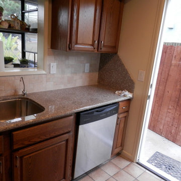Kitchen Cabinets and Refinish with New Counter top