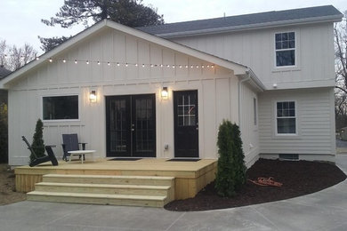 Mid-sized elegant white two-story wood exterior home photo in Columbus