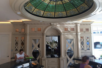Home bar - huge traditional home bar idea in Cincinnati