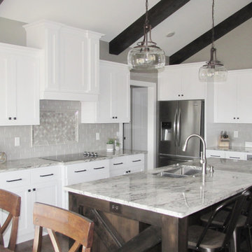 White Farmhouse Kitchen w/ Rustic Cathedral Ceilings