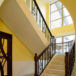 This is an example of an expansive and mixed classic u-shaped staircase in Nagoya with marble treads and marble risers.