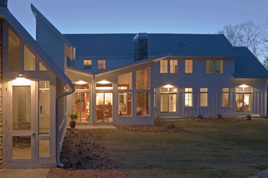 Large transitional white two-story concrete fiberboard exterior home photo in Atlanta