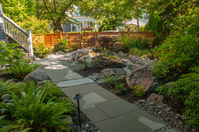 Inspiration for a contemporary front yard concrete paver garden path in Vancouver.