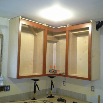 Cabinets being built around existing plumbing