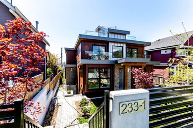 Example of a trendy home design design in Vancouver