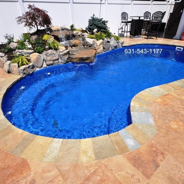 Aloha Neptune fiberglass Swimming pool installation by Gappsi in Oceanside, NY.