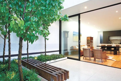 This is an example of a contemporary patio in Melbourne.