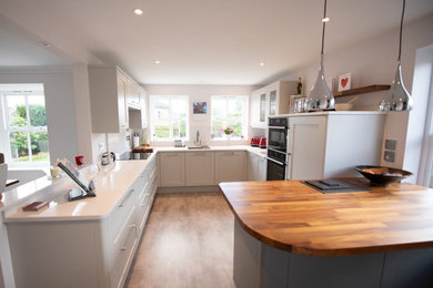 Design ideas for a medium sized modern kitchen in Gloucestershire.