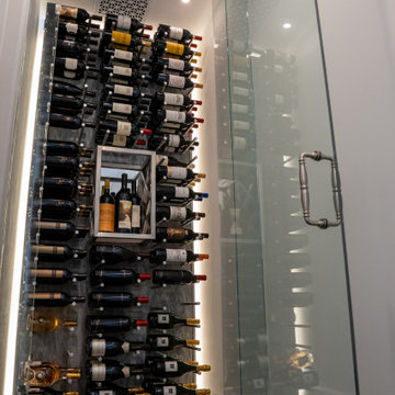 Triple-Deep Metal Pegs for Narrow Wine Cellars in Modern Hallways