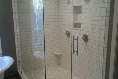 Example of a mid-sized transitional master vinyl floor bathroom design in Denver with beaded inset cabinets, white cabinets, a two-piece toilet, green walls and an undermount sink