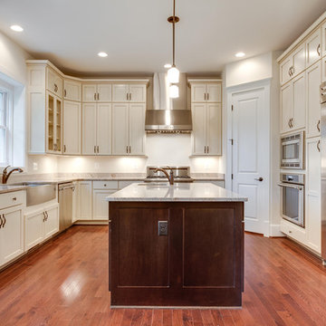 Beautiful custom kitchen with stacked cabinets