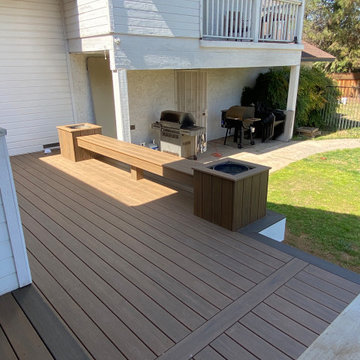 Trex toasted sand deck with coastal bluff accent.