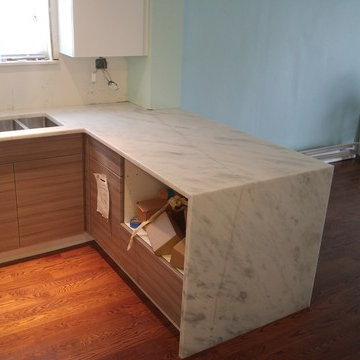 3 cm super white quartzite with book matched waterfall edge