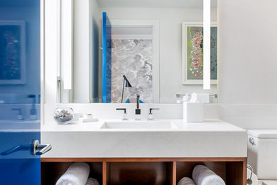 Example of a small trendy master white tile and ceramic tile mosaic tile floor, white floor and single-sink doorless shower design in Toronto with an integrated sink, open cabinets, medium tone wood cabinets, a two-piece toilet, white walls, quartz countertops, a hinged shower door, white countertops and a freestanding vanity