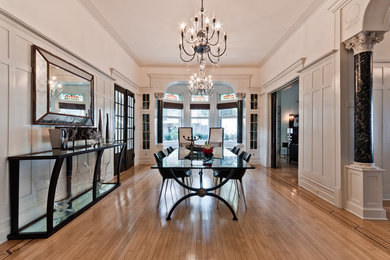 Inspiration for a large contemporary light wood floor great room remodel in Montreal with white walls