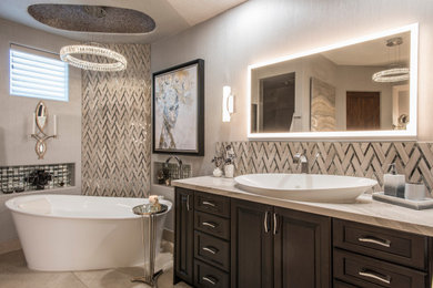Bathroom - huge contemporary master single-sink bathroom idea in Phoenix with dark wood cabinets and a built-in vanity
