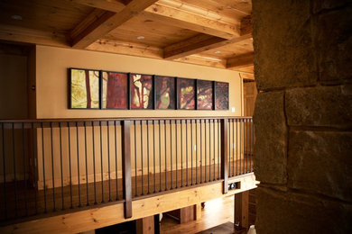 Inspiration for a large transitional light wood floor hallway remodel in Toronto